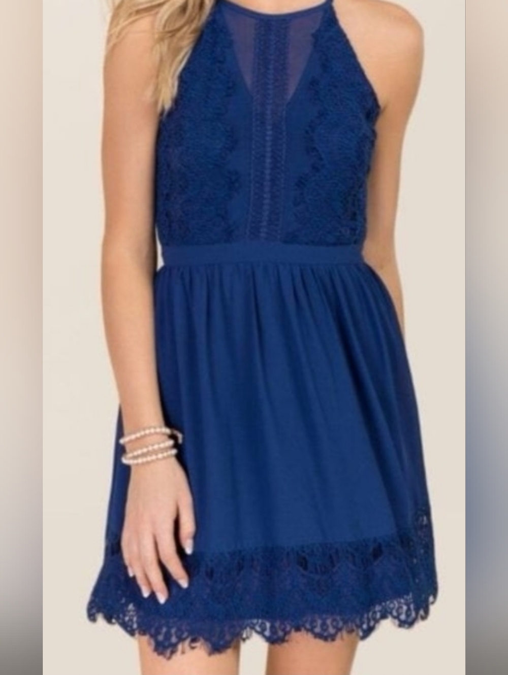Francesca's Collections Vibrant blue lace halter dress featuring a fitted bodice